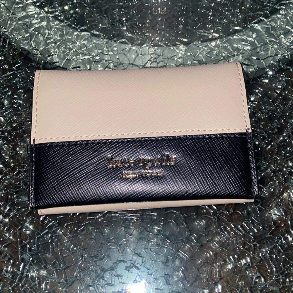 Women’s Kate Spade Bifold small wallet.